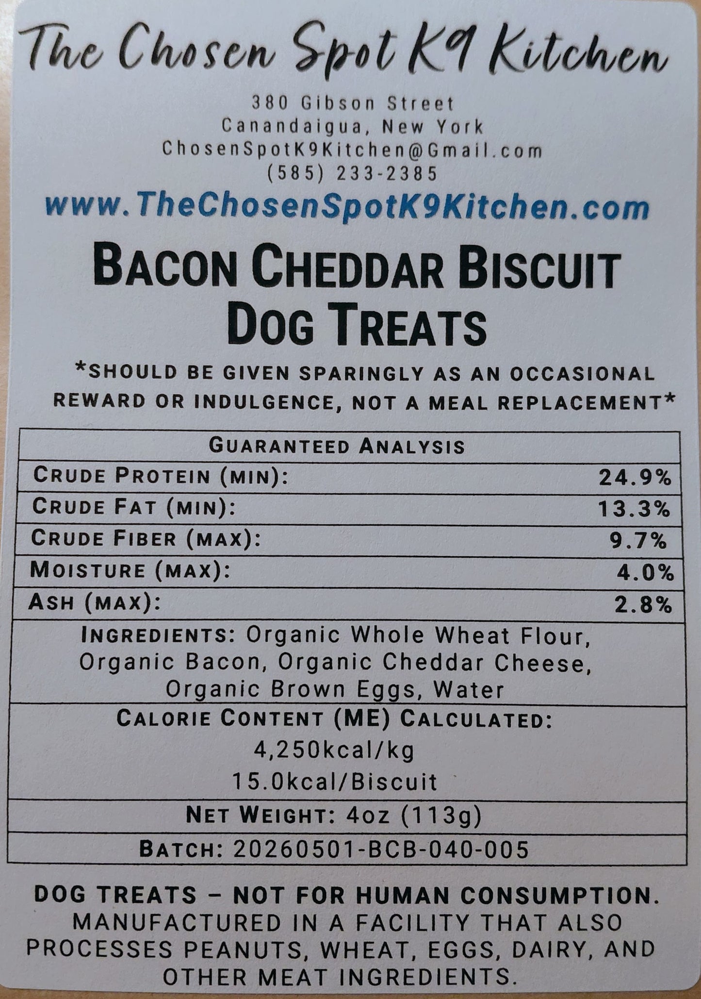 Dog treat Gruaranteed Analysis abel for 'Bacon Cheddar Biscuits' from The Chosen Spot K9 Kitchen with nutritional information and ingredients.