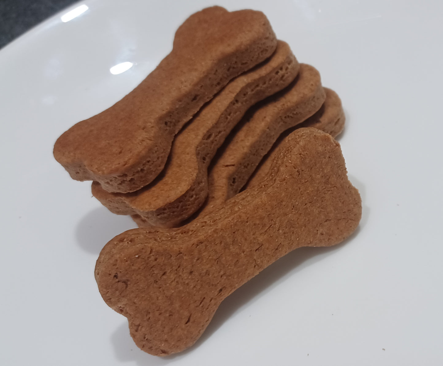 Peanut Butter Bones (Low-Fat) organic dog treats angled to left