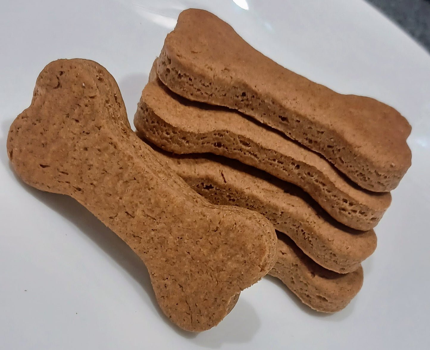 Peanut Butter Bones (Low-Fat) organic dog treats angled from right