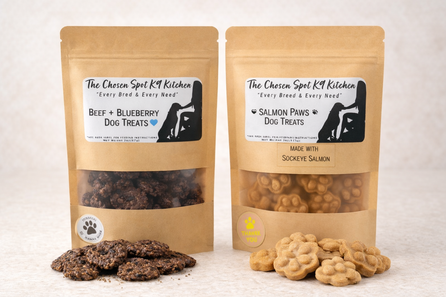 Beef + Blueberry Bites and Salmon Paws handmade organic dog treats from The Chosen Spot K9 Kitchen showing 2 bags of dog treats with treats in front on a neutral background.